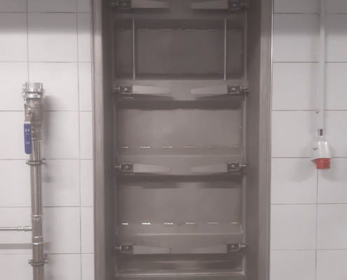 Wasserdrucktüre mit beidseitig bedienbaren Einreibern